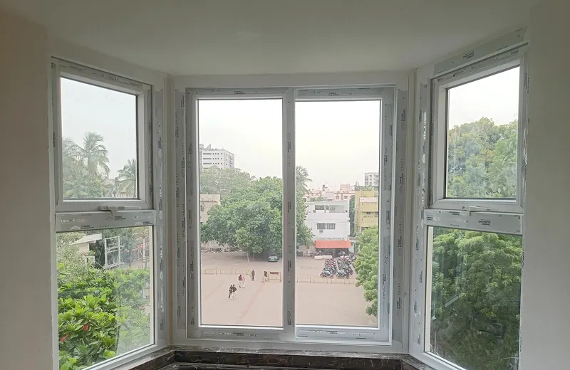 Semi-hexagonal uPVC bay window with three angled frames
